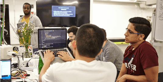 Redi school students working on a N3XTCODER hackathon