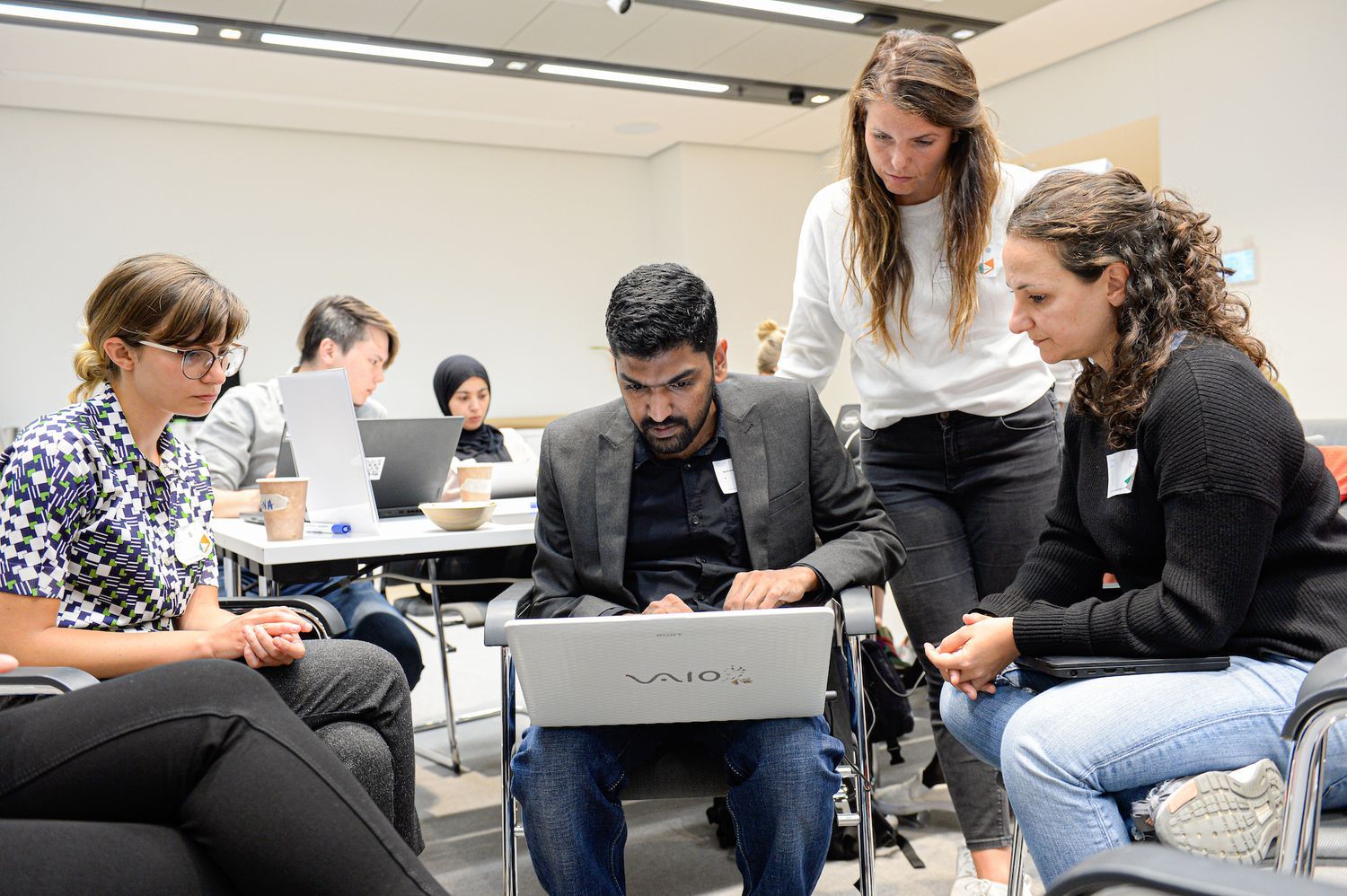 Team working on a challenge from the hackathon.